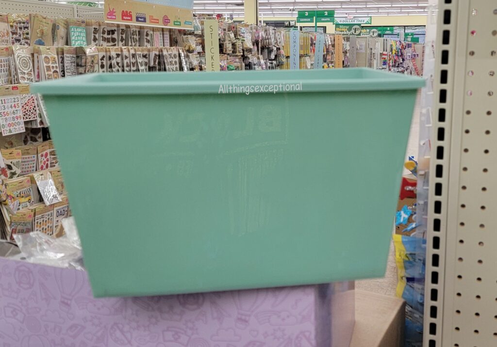 A light green storage bin from Dollar Tree.