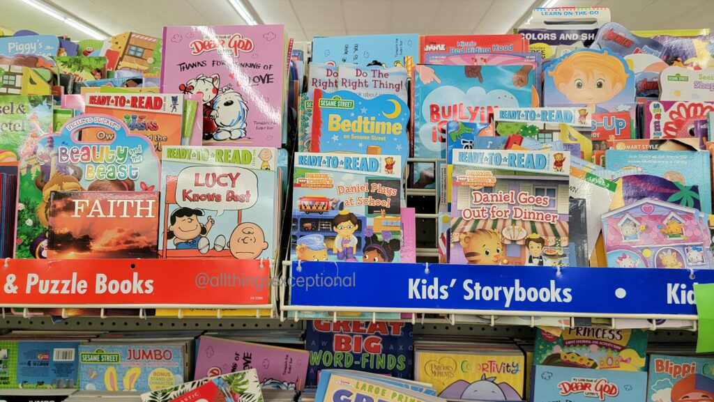 Children's books on shelves.