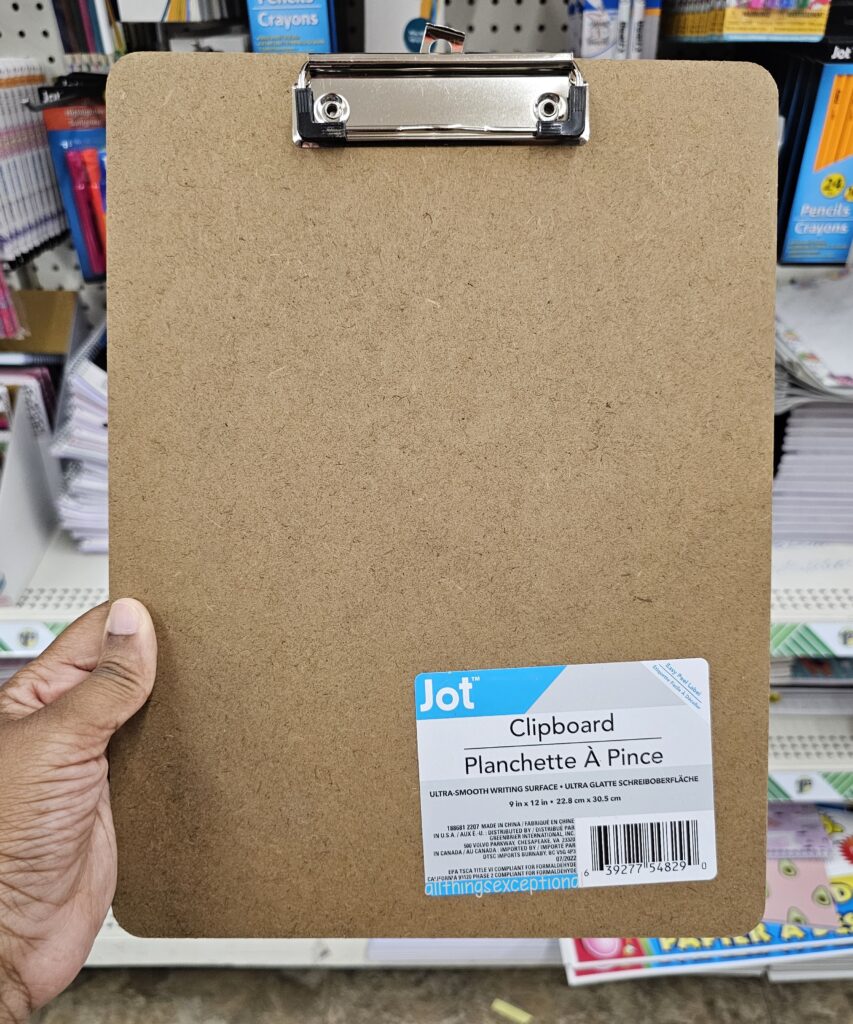 A brown clipboard from Dollar Tree.